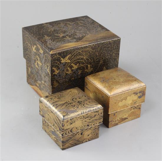 Three Japanese gilt and silver decorated lacquer boxes, late 19th / early 20th century, both 8cm